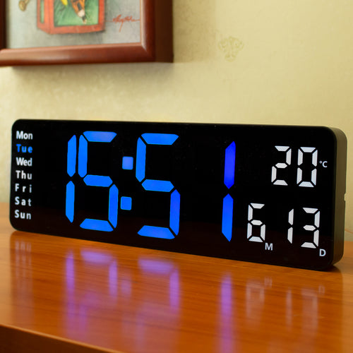 Opis Clock 1: Die digitale Wanduhr mit leuchtenden Ziffern