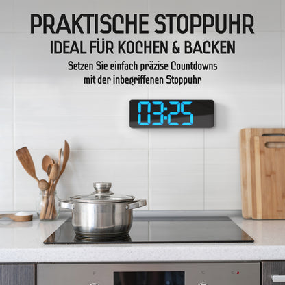 Opis Clock 1: Die digitale Wanduhr mit leuchtenden Ziffern
