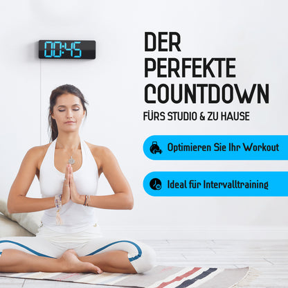 Opis Clock 1: Die digitale Wanduhr mit leuchtenden Ziffern