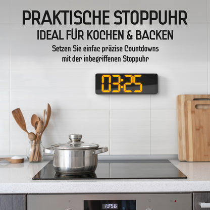 Opis Clock 1: Die digitale Wanduhr mit leuchtenden Ziffern