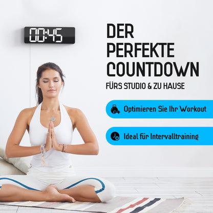 Opis Clock 1: Die digitale Wanduhr mit leuchtenden Ziffern