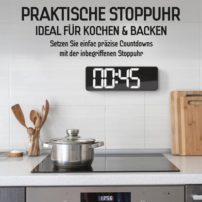 Opis Clock 1: Die digitale Wanduhr mit leuchtenden Ziffern